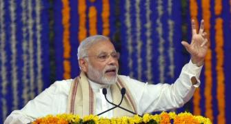 PM warns of 'surgical strikes' against black money