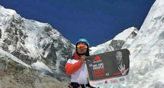 Nepali woman scales Mount Everest with anti-trafficking message