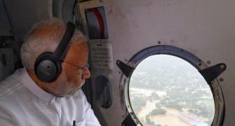 PM surveys flood-hit Kerala, grants Rs. 500 cr emergency aid