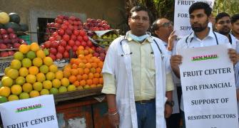 Why are these doctors selling fruits?
