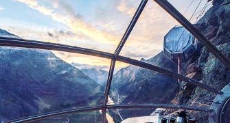 Would you sleep in a glass pod suspended off a mountainside?