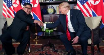 Kim vows complete denuclearisation at historic summit with Trump
