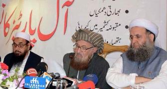 Imran Khan's minister shares stage with terrorist Hafiz Saeed