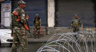 Traffic cop among 14 hurt in grenade attack in Kashmir