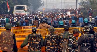 Delhi cops on 'non-stop' duty, wish for normalcy