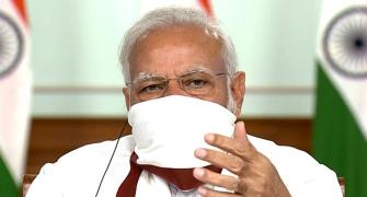Modi wears homemade mask at meet with CMs