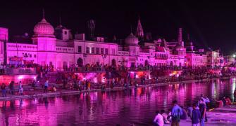 PIX: Early Diwali in Ayodhya, people light lamps