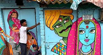 Colourful murals bring a smile to a Delhi slum