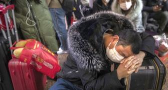 China shuts down 13 cities as coronavirus toll rises
