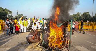 SEE: Cong workers set tractor afire at India Gate