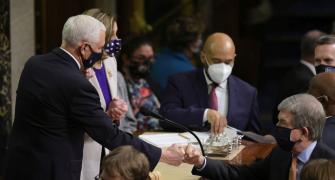 PIX: Fist bumps greet US Congress ratifying Biden win