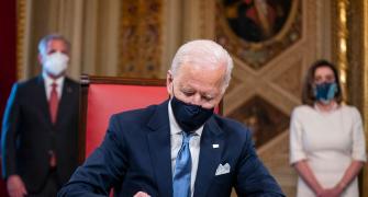 On Day 1, Biden signs 15 executive orders