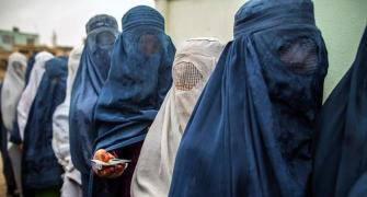 Taliban order women to cover up head to toe