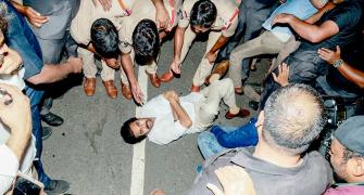 Stopped at AP border, Pawan Kalyan lies down on road