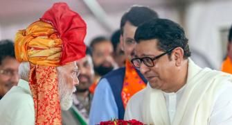 Raj shares stage with Modi, justifies support to NDA