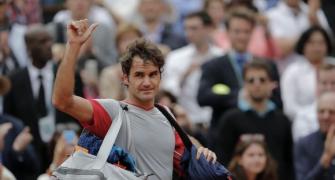 French Open PHOTOS: Federer knocked out of French Open by Gulbis