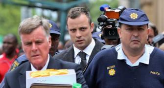 'Angry' Pistorius fired shot out of car sun-roof, ex-girlfriend tells court