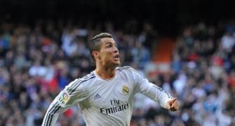 Ronaldo helps lift Real to the top of La Liga