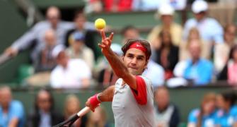 French Open photos: Federer, Djokovic drop set
