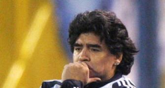 Argentines struggle to keep faith in Maradona