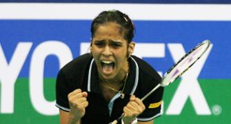 Saina in World badminton quarters, Yihan upset