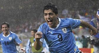 Images: Suarez dream double puts Uruguay through