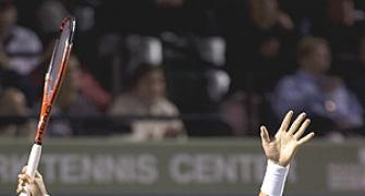 Berdych stuns Federer, Nadal advance in Miami
