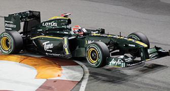 Lotus F1 team boss torn over name change