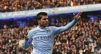 Images: Aguero magic helps leaders Man City march on