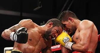 Amir Khan loses titles to Peterson