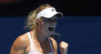 Wacky Wozniacki bounces into Melbourne quarters