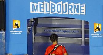 Ferrer stuns injured Nadal, Murray, Clijsters surge ahead