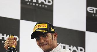Abu Dhabi GP: Hamilton wins, rare retirement for Vettel