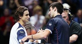 Ferrer tames outstanding player of the year Djokovic