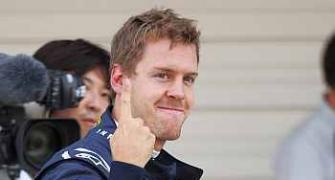 Vettel pips Button to Japanese pole