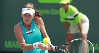 Radwanska upsets Sharapova to win Miami title