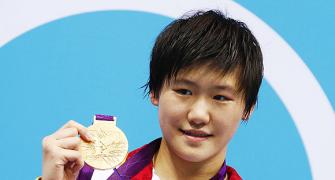 China's swimming sensation not affected by doping claims