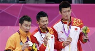 Lin outwits Lee again to win badminton gold