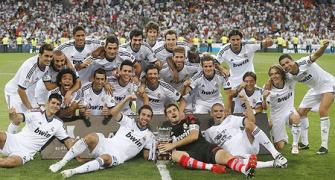 PHOTOS: Real Madrid beat 10-man Barca to lift Super Cup