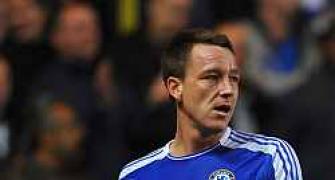 Chelsea's Terry denies racism charges