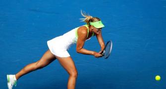 PHOTOS: Sharapova, Serena and Djokovic cruise at Aus Open