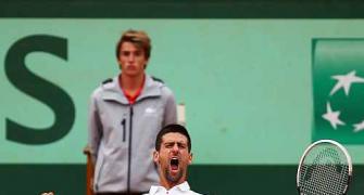 PIX: Federer, Djokovic rally into French Open semis