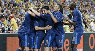 France storm past Ukraine in rain-affected match