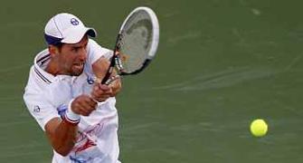 Djokovic subdues aggressive Stakhovsky in Dubai