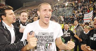 Juventus claim Serie A crown after AC lose Milan derby