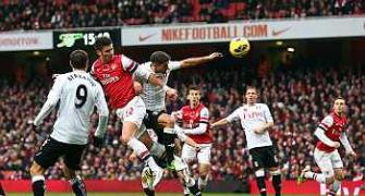 Arsenal waste two-goal lead to draw with Fulham