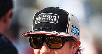 Title contender Raikkonen happy at Lotus, for now
