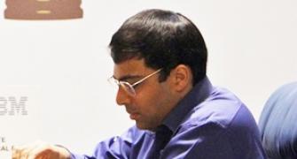 Anand draws with Carlsen; Caruana continues to leads