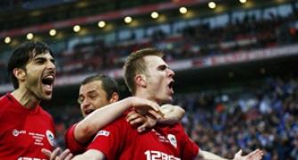 FA Cup: Wigan reach final as Millwall fans fight themselves
