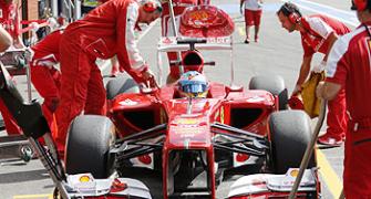 Formula One: Vettel, Alonso suffer punctures at Spa, demand answers